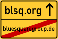Ortsausgangsschild (Zeichen 311) mit Beschriftung »BLSQ.ORG | bluesquaregroup.de«